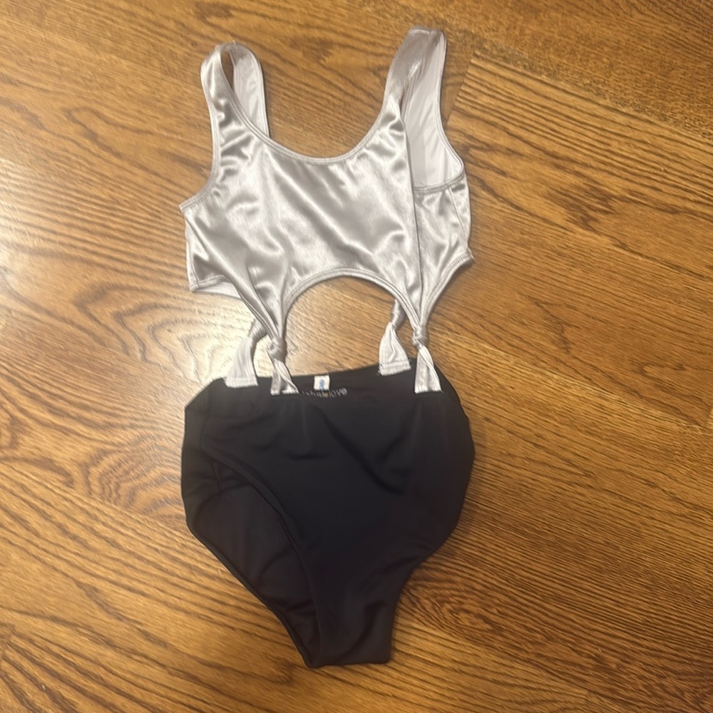 global love (flowers by zoe) girls size large bathing suit. Worn once or twice